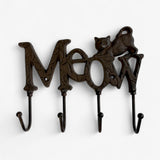 Brown cast iron cat wall hooks featuring playful meow design with metal hooks below