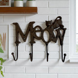 Rustic cast iron Meow cat hook rack with 4 hanging hooks and textured brown finish