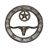 Circular cast iron western plaque featuring longhorn bull and star design wall decor