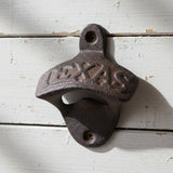 Texas Lone Star cast iron bottle opener with star detail and weathered dark iron finish
