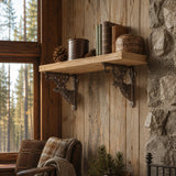 Rustic lodge wall shelf with brown cast iron deer brackets and cabin decor
