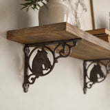 Brown cast iron horse head shelf bracket supporting a rustic wood wall shelf