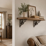Living room wall shelf with brown cast iron horse brackets and wood decor