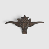 Aged rust brown cast iron longhorn with star, textured Western wall hanging piece