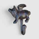 Distressed cast iron pig hook close up detail blue black patina finish