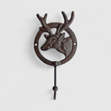 Antique-finish cast iron deer wall hook showing intricate antler detail, dark brown patina