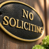 "No Soliciting" Oval Wall Sign, Cast Iron Black and Gold, 6.8" GB78045 shot 2
