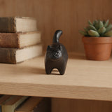 Close view of black cast iron cat paperweight with arched tail, SKU GB78102