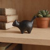 Side view of black cast iron standing cat paperweight, SKU GB78102