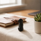 Front view of seated black cast iron puppy desk decor, SKU GB78103
