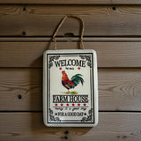 Rustic cast iron farmhouse welcome sign with rooster design, white enamel metal wall decor