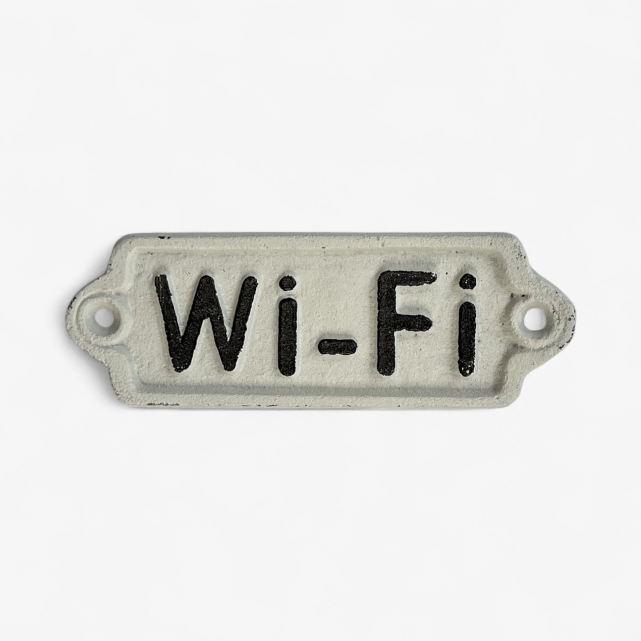 Cream enamel Wi-Fi plaque with black text showing mounting holes and aged metal patina