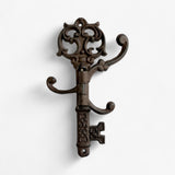 Dark bronze cast iron vintage skeleton key wall organizer with three curved hooks