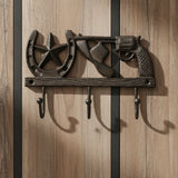 Western cast iron cowboy hook with star, horseshoe, revolver accents, 3 coat hooks, distressed bronze