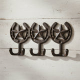 Rustic brown cast iron star and horseshoe hooks wall organizer with triple design