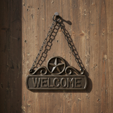 Rustic cast iron welcome sign with star and chain, black textured metal
