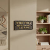 House Rules cast iron plaque wall decor with vintage bronze finish, mounted indoors