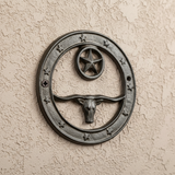 Longhorn and star cast iron wall plaque with decorative border and rustic aged finish