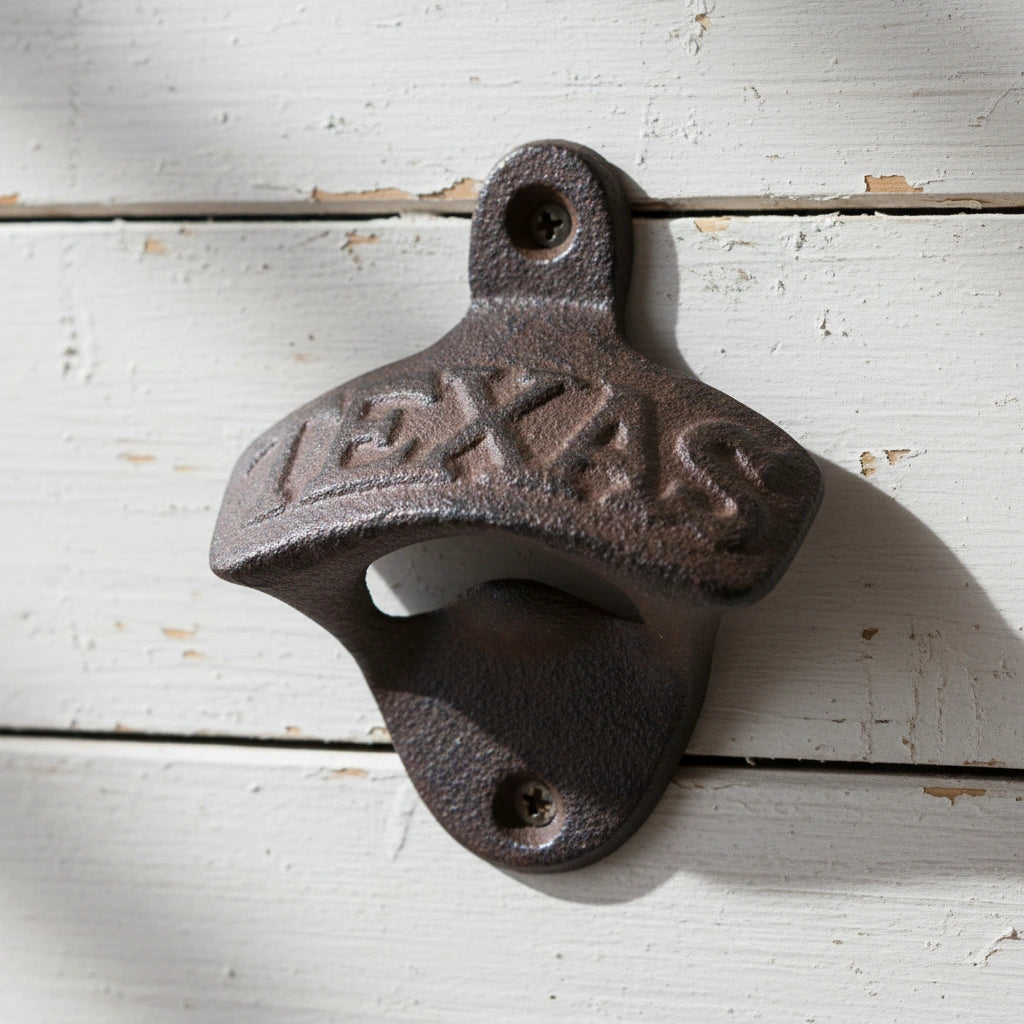 Texas Lone Star cast iron bottle opener with star detail and weathered dark iron finish