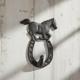 Cast iron horseshoe hook with horse figurine topper, black farmhouse wall decor