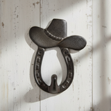 Cast iron saloon hat hook with horseshoe and cowboy hat top, blackened finish