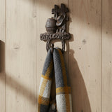 Cast iron welcome barrel hook with rustic cowboy design, entryway decor