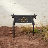 Cast iron Texas boot scraper with star handles, gold lettering, dark finish, rustic farmhouse