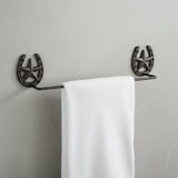 Cast iron horseshoe towel rack with star center and rod western farmhouse decor
