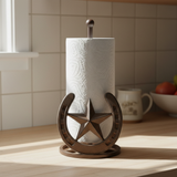 Western cast iron star horseshoe paper towel holder with brown finish on countertop