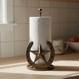 Western cast iron star horseshoe paper towel holder with brown finish on countertop