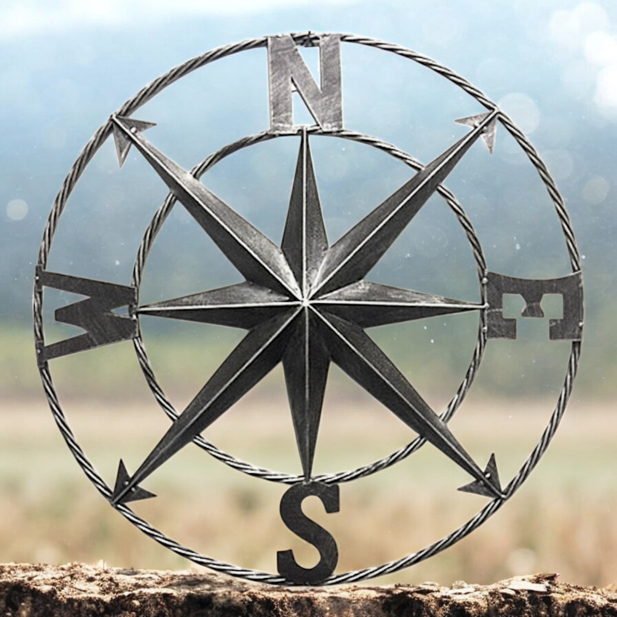 Distressed metal compass wall sign 24 inch with rope hanger, gray and black finish