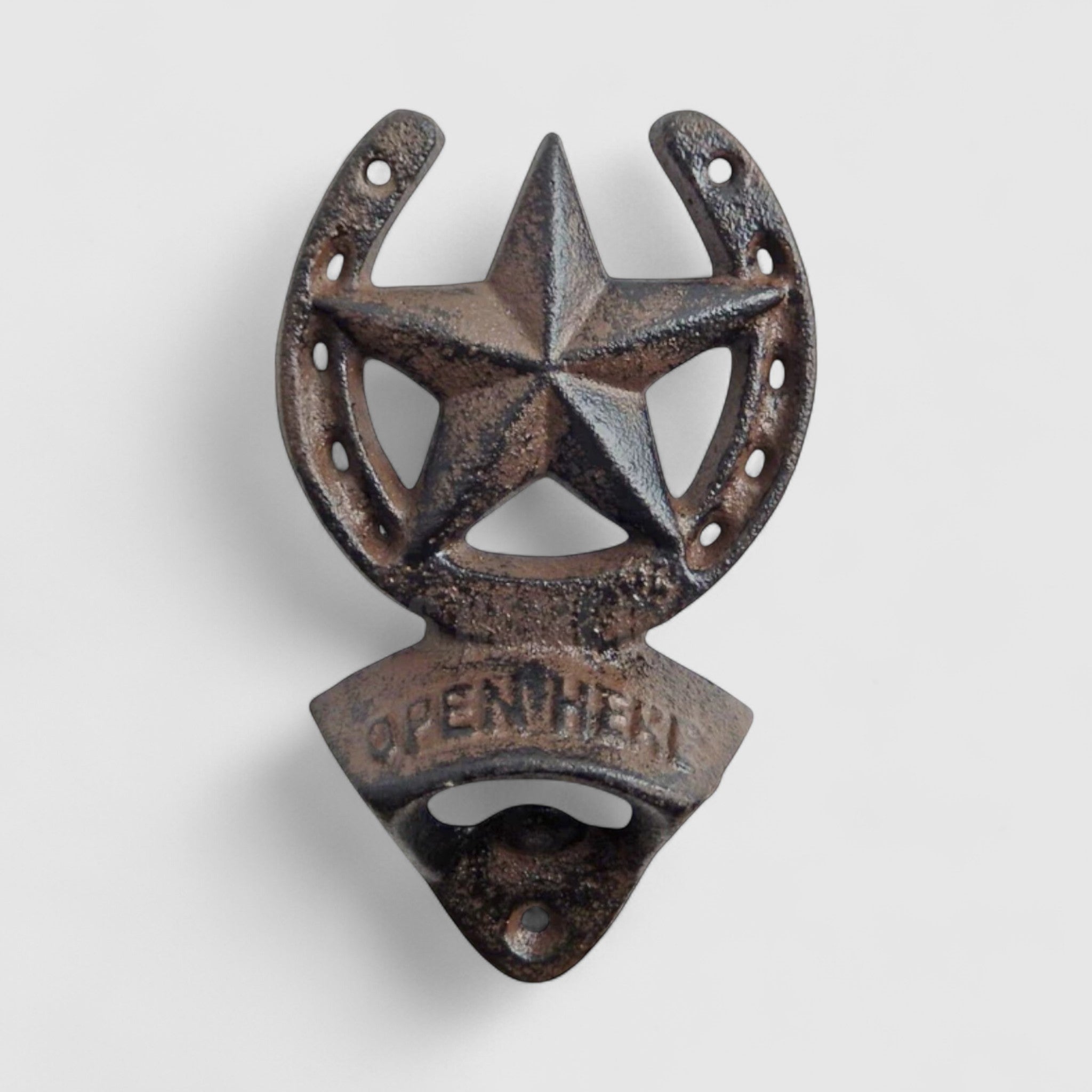 Cast iron rustic star bottle opener showing horseshoe and opener design in antique brown
