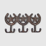 Single cast iron decorative hook in rustic brown finish with curved scroll detail