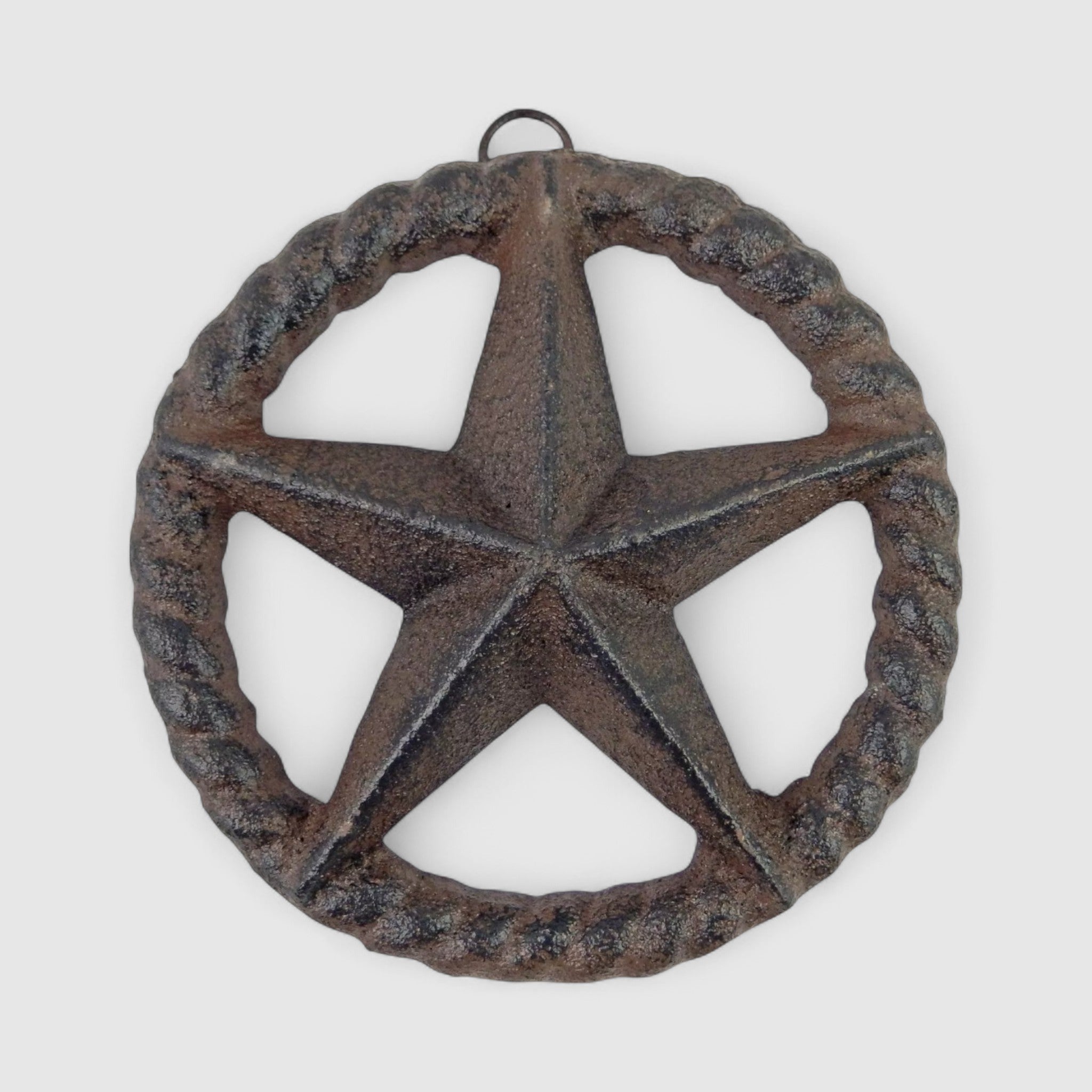 Weathered charcoal cast iron roped star ornament with rustic patina finish