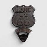 Dark gray cast iron Route 66 bottle opener hanging from chain detail shot