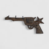 Western revolver gun hook ornament, rust finish, star design, wall mount
