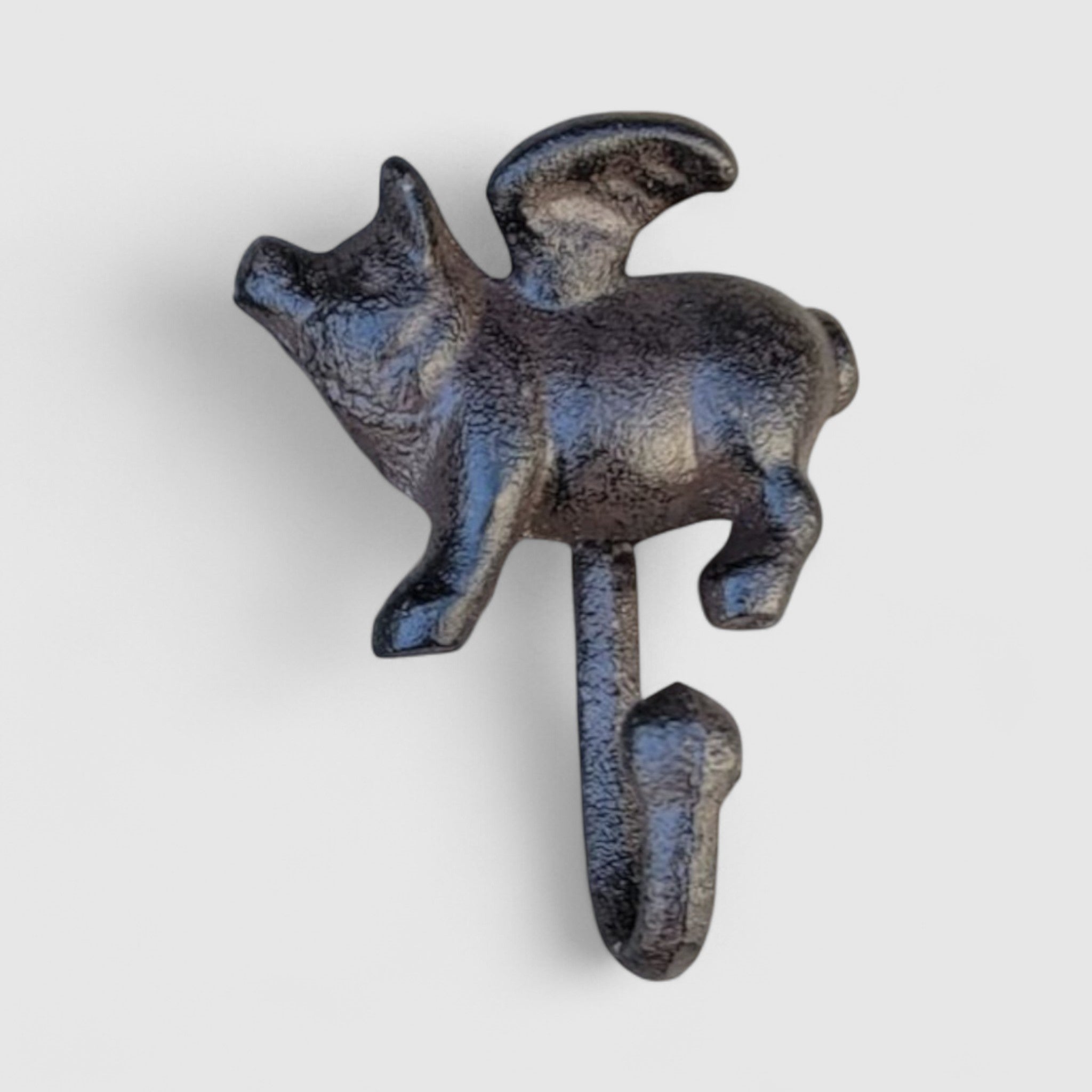 Distressed cast iron pig hook close up detail blue black patina finish