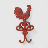 Red cast iron rooster wall hook with decorative scrollwork base, country style