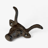 Cast iron longhorn cattle head wall mount with curved horns in dark distressed metal finish