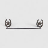 Blackened cast iron horseshoe star towel rack front view rustic western farmhouse style