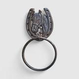Close-up of detailed cast iron horse head towel ring showing textured mane and mounting holes