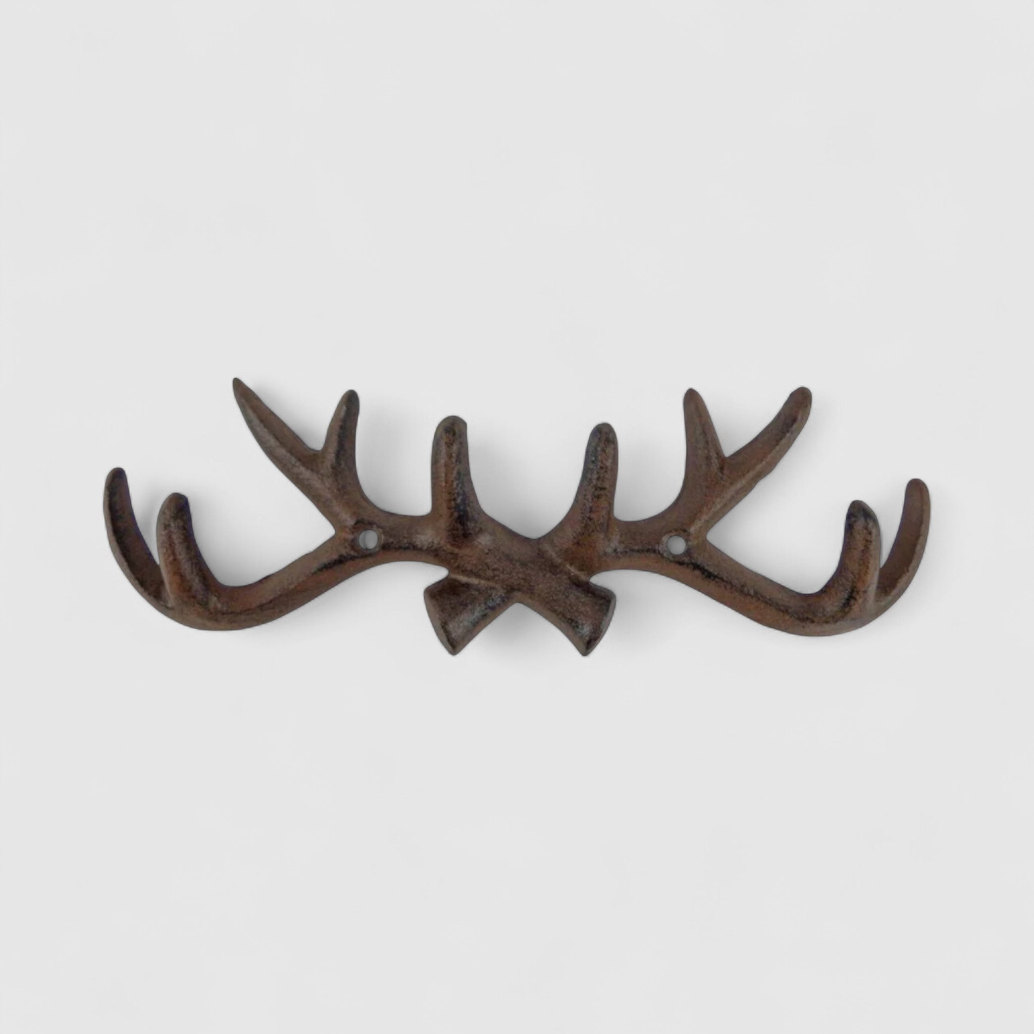 Cast iron antler coat rack, weathered brown patina, functional rustic wall hook