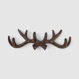 Cast iron antler coat rack, weathered brown patina, functional rustic wall hook
