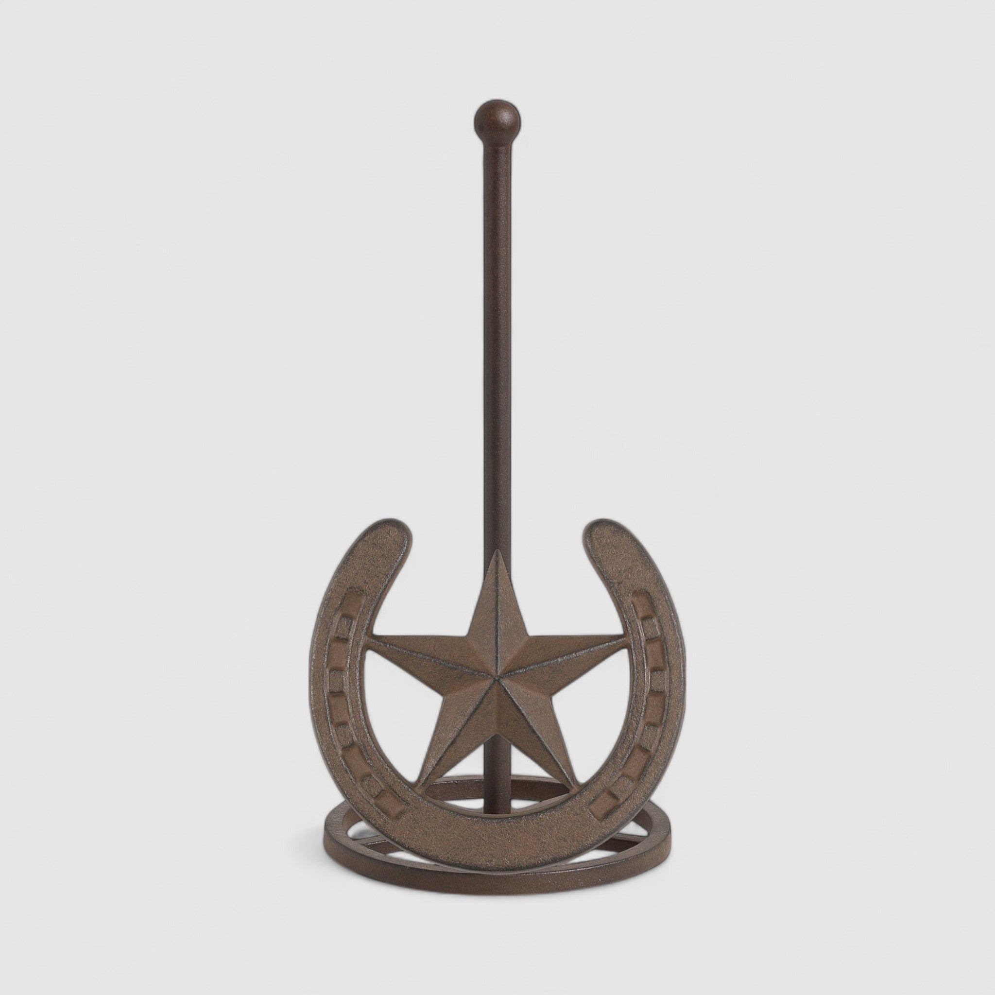 Brown cast iron paper towel holder stand with star and horseshoe design, full product view