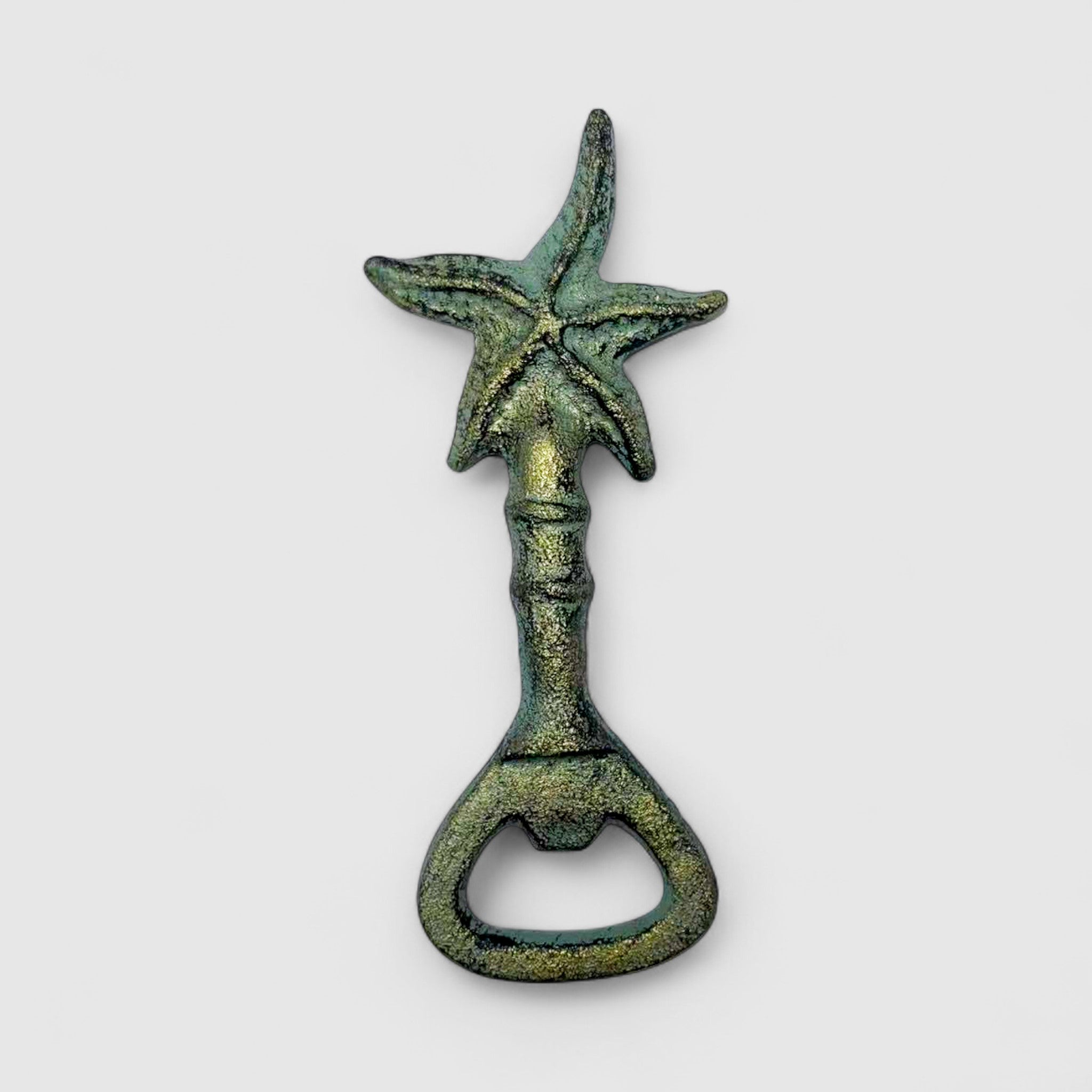 Verdigris cast iron starfish bottle opener and corkscrew, upright view showing detailed finish