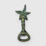 Verdigris cast iron starfish bottle opener and corkscrew, upright view showing detailed finish