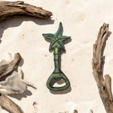 Verdigris cast iron starfish bottle opener with weathered green patina, coastal bar tool