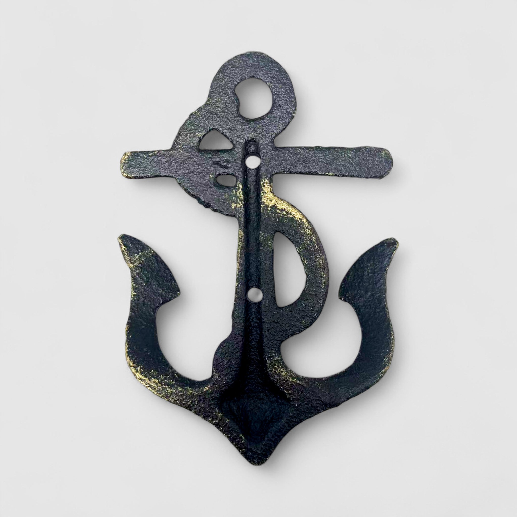 Verdigris patina cast iron anchor hook on turquoise coastal door