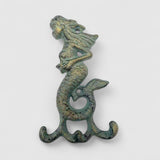 Aged green cast iron mermaid hook with tail detail, beach house decor