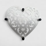 Cast iron heart trivet with black feet, vintage white finish ornate kitchen accent